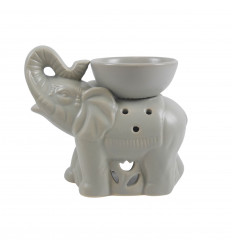 Burning Indian elephant perfume in craft grey ceramic